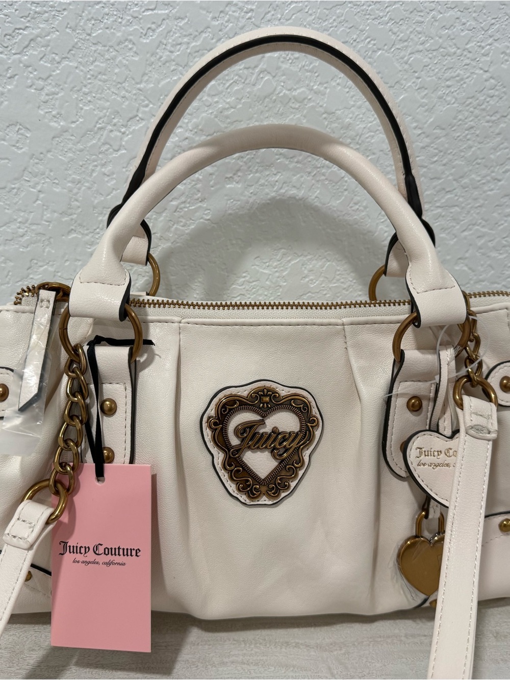 Juicy Couture Leather Satchel Handbag color cream